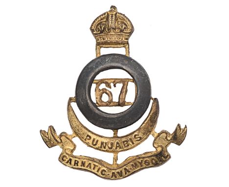 Indian Army. 67th Punjabis Officer's cap badge circa 1903-22.  Good scarce British made die-stamped gilt with applied silver 