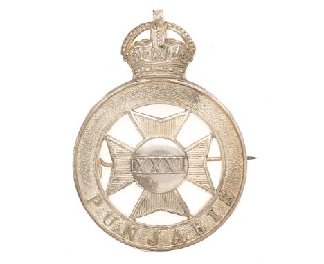 Indian Army. 31st Punjabis pagri badge circa 1903-22.  Good scarce British made large die-stamped white metal crowned PUNJABI