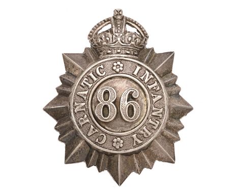 Indian Army. 86th Carnatic Infantry Officer's cap badge circa 1903-22.  Good scarce die-stamped crowned star bearing circlet 