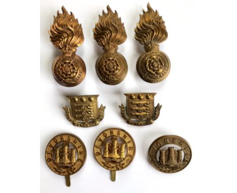 8 Victorian / Edwardian head-dress badges.  3 x Royal Fusiliers post 1901 fur cap grenades ... 2 x Army Ordnance Corps large 