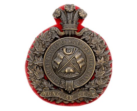 Canadian. 14th Bn. (Princess of Wales's Own Rifles)  Militia helmet plate.  Good scarce die-stamped blackened brass Maple spr