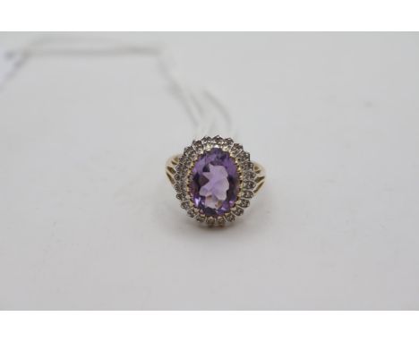 Ladies 9ct Gold Amethyst & Diamond Cluster ring Size R. 5g total weight 