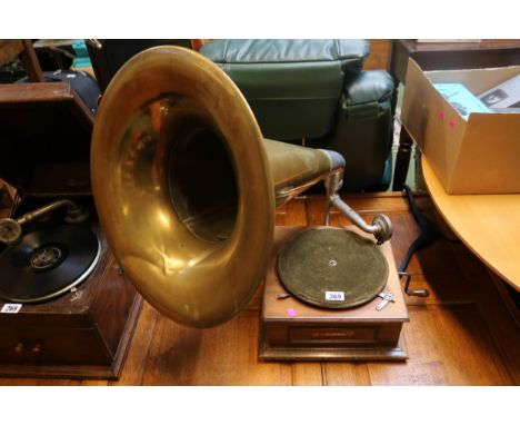 The Alert Oak cased record player with Brass trumpet 