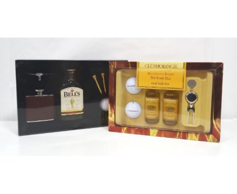 TWO GOLF AND WHISKY GIFT SETS
comprising: one Bell's gift set containing flask of Bell's Blended Scotch Whisky (10cl/ 40% abv