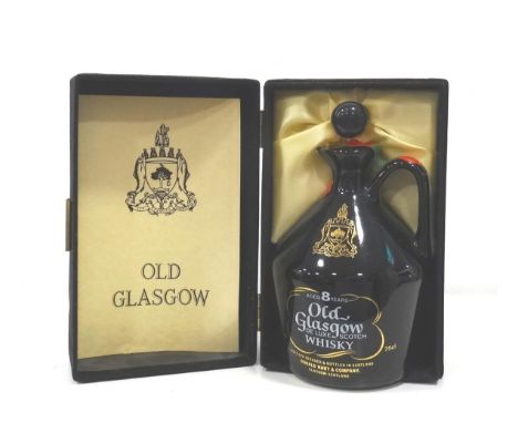 OLD GLASGOW 8YO DELUXE 
A well presented ceramic decanter of Old Glasgow 8 Year Old De Luxe Blended Scotch Whisky.  75cl.  40