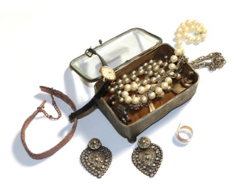 Two simulated pearl necklaces, a lady's wristwatch, a plated chain, a brooch, two white metal pendants, a plated locket, a bl