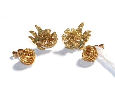 A pair of 18 carat gold floral spray earrings, with post fittings and a pair of 9 carat gold knot earrings, with post fitting