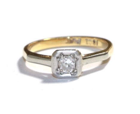 A diamond solitaire ring, stamped '18CT' and 'PLAT', finger size I.  Gross weight 2.5 grams. 