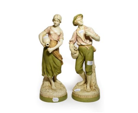 A pair of post 1919 Royal Dux figures of a man and woman drinking, model numbers: 2155 &amp; 2156, 45cm high 