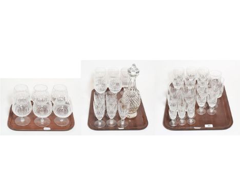 A collection of Waterford glass, Colleen pattern, comprising eight tall wine glasses, five champagne flutes, six brandy glass