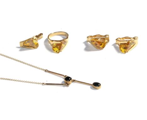 A 9 carat gold onyx necklace, length 46cm together with a yellow paste suite comprising of a 14 carat gold ring, finger size 