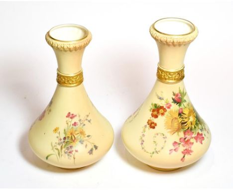 A near pair of Royal Worcester blush ivory and floral painted vases, shape numbers: 2187, 27cm high 