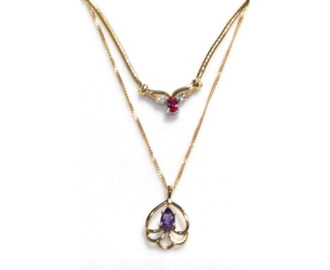 A 9 carat gold amethyst pendant on a 9 carat gold chain, pendant length 2.3cm, chain length 40cm and a 9 carat gold synthetic