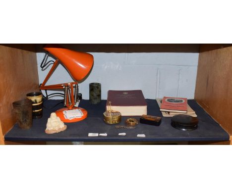 An orange Anglepoise lamp - museum purposes only, an Eastern rug, two horn beakers, an alabaster Buddha and beaker, two papie