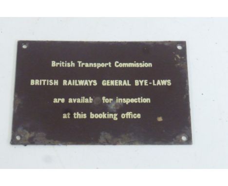 A small British Transport Commission enamel plaque - General bylaws are available for inspection at this booking office, 6 x 