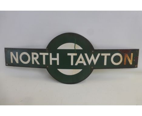 A Southern Region enamel station target for North Tawton, 36 x 13". 