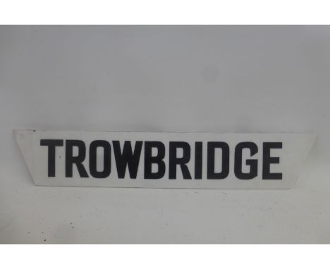 A milk glass destination plaque for Trowbridge, 16 x 3".