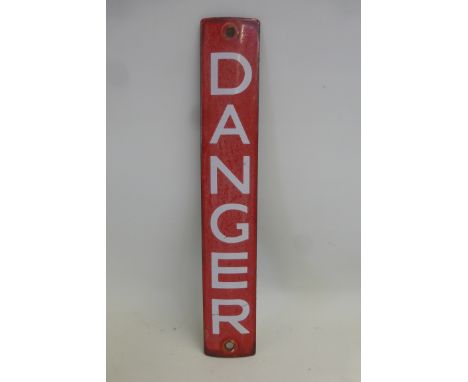 A narrow Danger convex enamel plaque, 2 x 12". 