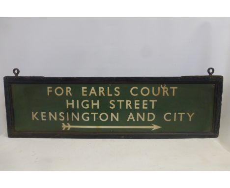 A rectangular pair of enamel signs back to back in wooden frame, Southern Region, the first 'For Earls Court, High St. Kensin