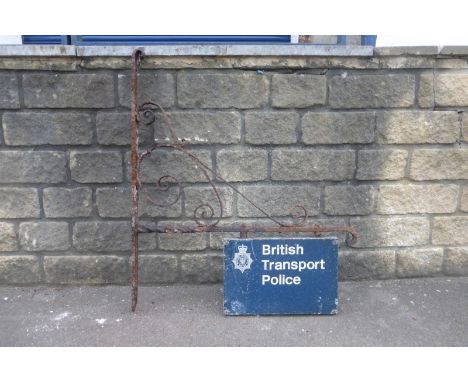 A British Transport Police double sided sign on wrought iron bracket, the sign 17 3/4 x 12".