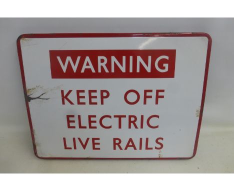 A rectangular enamel sign - Warning Keep Off Electric Live Rails, 24 x 18".