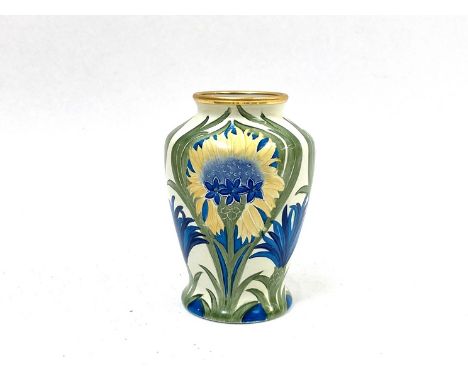 A Moorcroft enamel miniature vase in Cornflower pattern,  limited edition, 19/150, 8cm tall