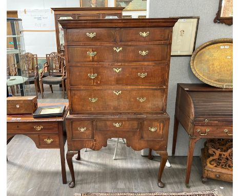 A Georgian style chest on stand of eight drawers, some moulding and veneer missing, 166cm x 99cm
