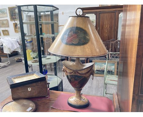 A hand painted Toleware table lamp base with violin design, shade loose, 77cm tall