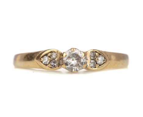 DIAMOND SOLITAIRE RING, set with a round brilliant cut diamond of approximately 0.20 carats, in nine carat gold, size K, 1.9g