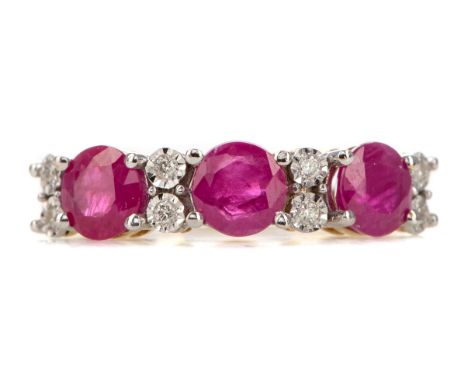 RUBY AND DIAMOND RING, set with round rubies interspaced by pairs of illusion set diamonds, marked 375, size M, 2.7g