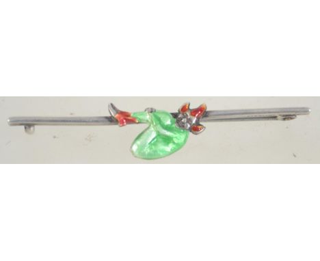 A vintage sterling silver and enamel bar brooch with figure of a pixie having a clip clasp. Measures 6cms .