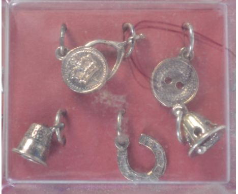 A set of 6 sterling silver Christmas pudding charms complete in original packaging. Made for Past Times.