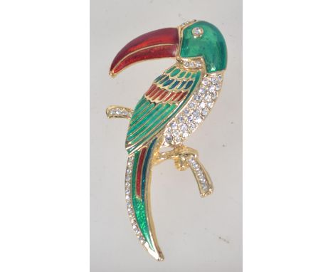 A large goldtone enamel and rhinestone set figural brooch in the form of a Toucan. Measures 7.5cms.