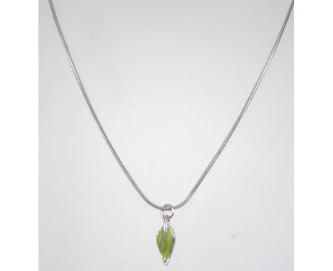 A 925 silver pendant necklace with enamel leaf drop pendant. Measures 16 inches.