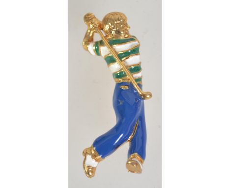 A gold tone enamelled figural brooch pin in the form of a golfer with roller clip clasp. Measures 5cms.