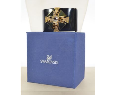 A boxed Swarovski crystal clamper cuff bracelet set with large crystal and enamel stepped Maltese cross in the Art deco Style