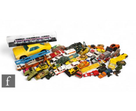 A collection of assorted diecasts including Corgi, Dinky, Matchbox, Britains and others, with a Midland Metro Urbos 3 model a
