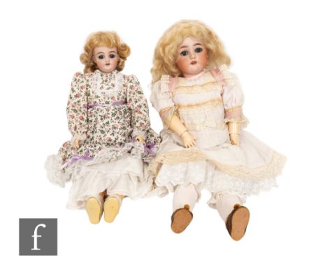 Two early 20th Century Simon &amp; Halbig bisque head dolls, with open mouths and teeth, composition bodies, impressed marks 
