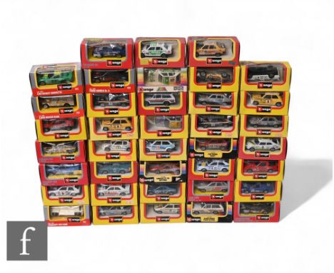 A collection of Burago 1/43 scale diecast cars including R5 Turbo Montecarlo, Range Rover Team Castrol, Mazda RX7, Ferrari 51