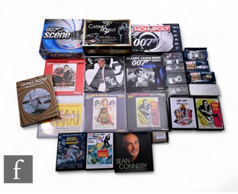A collection of James Bond 007 toys and related memorabilia including Casino Royale luxury casino set, jigsaws, Monopoly, Sce