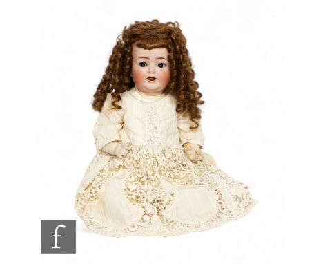 An early 20th Century Kammer &amp; Reinhardt Simon &amp; Halbig bisque head '126' doll, with trembling tongue, up / down and 