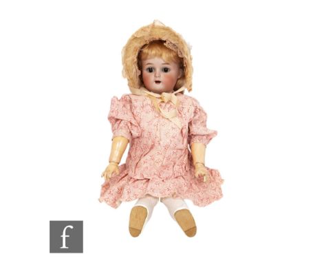 An early 20th Century&nbsp;Kammer &amp; Reinhardt Simon &amp; Halbig bisque head doll, open mouth with teeth, sleeping eyes, 
