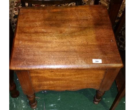A Good 19th Century Mahogany Commode, standing on turned supports.