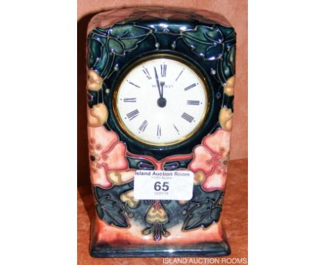 A Moorcroft pottery mantel clock - 16cm high - signed to the base