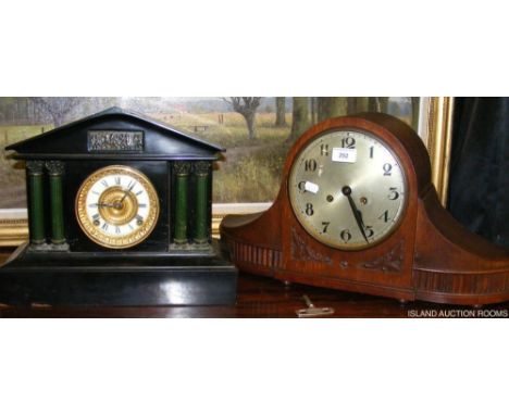A Victorian slate mantel clock, together with a chiming oak cased mantel clock