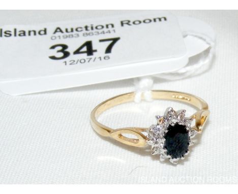 Sapphire and diamond ring in gold setting