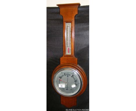 A wall barometer/thermometer, figures of King and Queen, together with an ink and pen stand