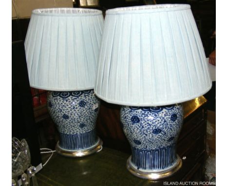 Pair of large bulbous shaped ceramic table lamps with blue glaze decoration