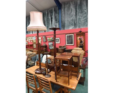 A group of furniture comprising an oak occasional table, an oak magazine rack, ropework stool (distressed), mahogany writing 