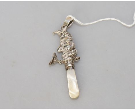 A silver child's rattle with figure of Mr Punch and mother of pearl handle, Birmingham 1914